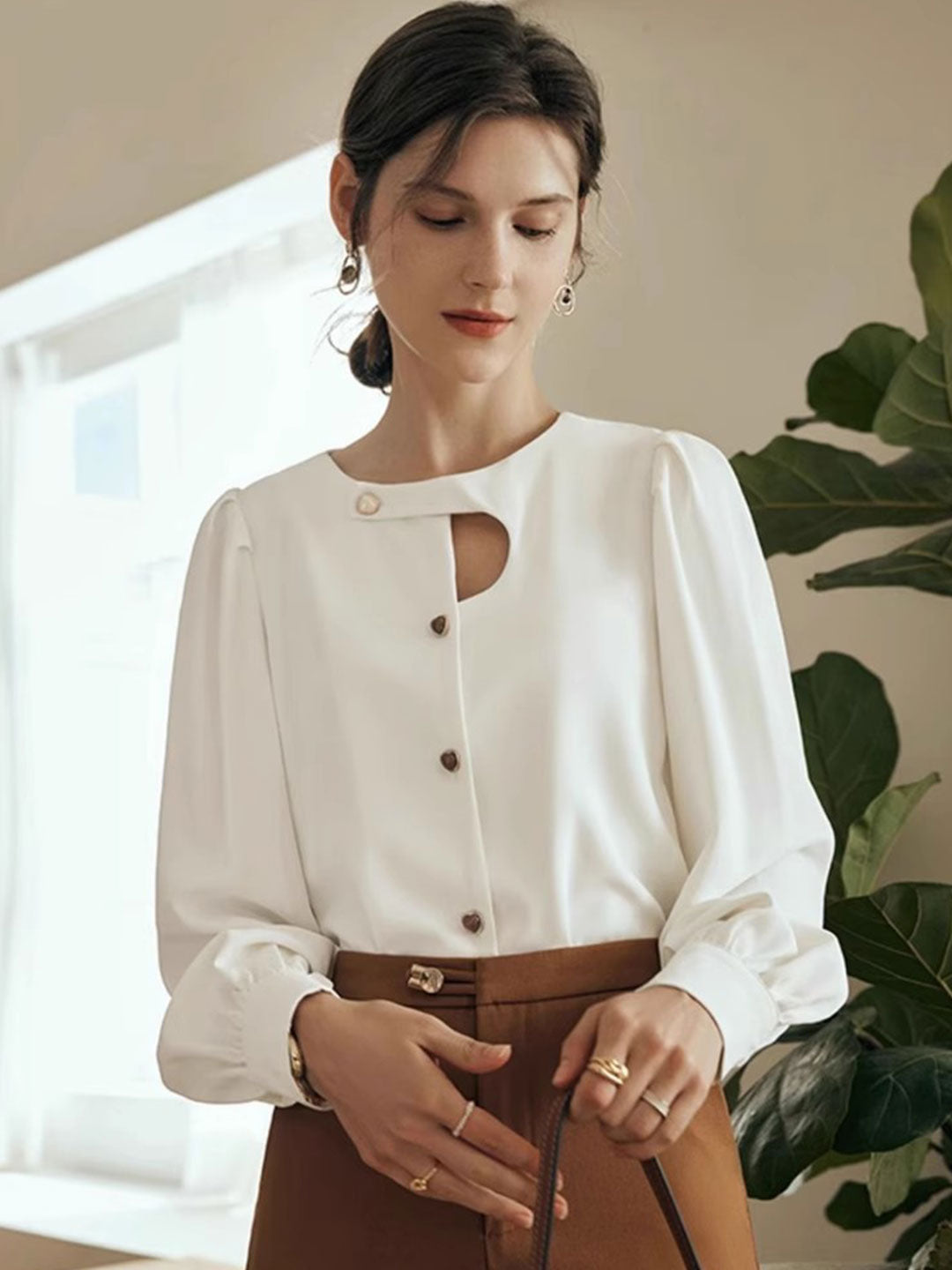 Mia – Blouse Elégante avec découpe Moderne et manches Bouffantes