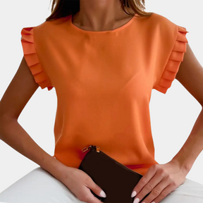 Dina – Blouse élégante à manches volantées, coupe fluide et confortable